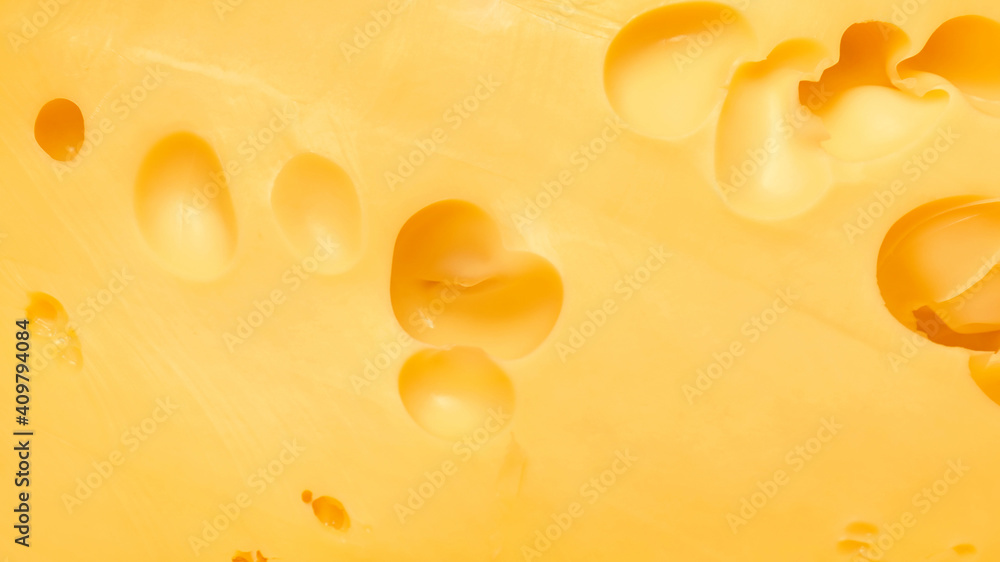 Texture of tasty cheese as background Texture of tasty cheese as background