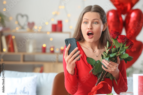Young woman video chatting ...