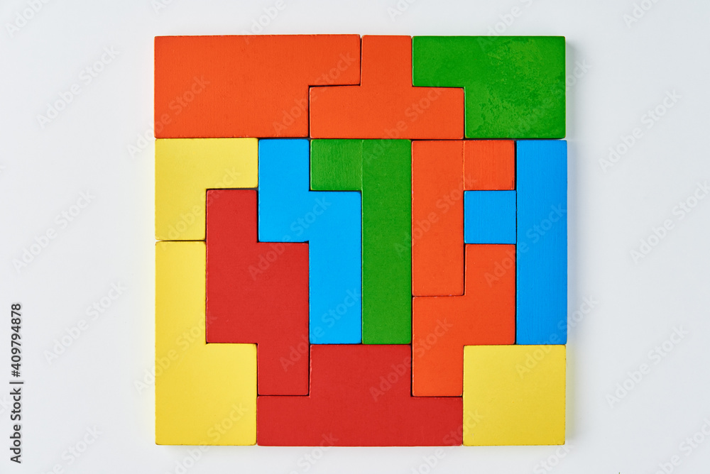 Obraz premium Different wooden blocks on white background. Concept of logical thinking and education