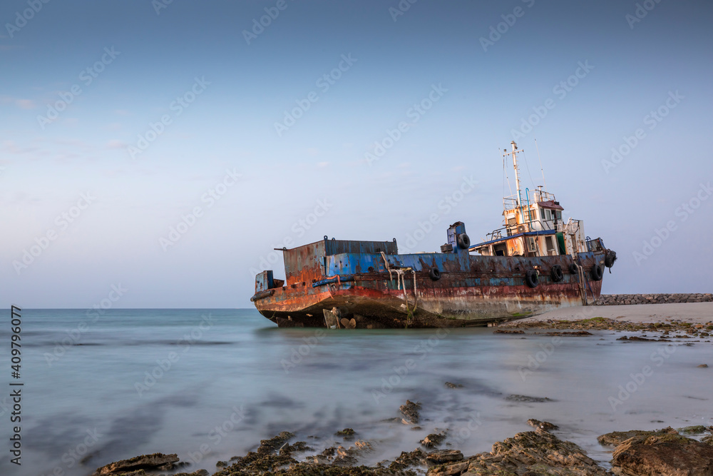old abandoned fishing boat on a beach
