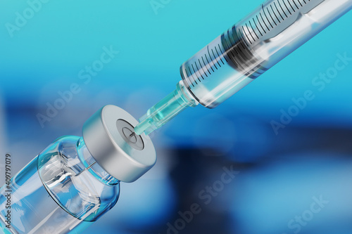 Foto Medical disposable syringe for vaccine injection and glass vial.