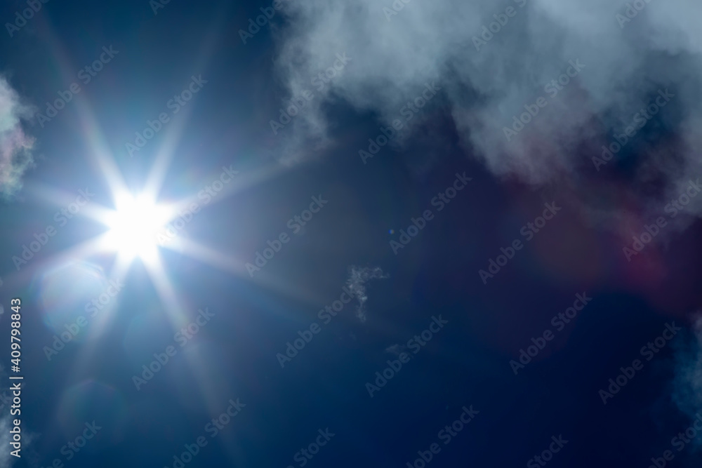 Naklejka premium sun in the clouds
