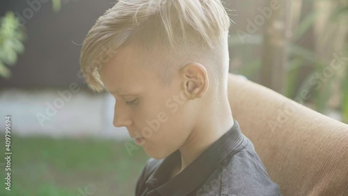 Teenager studying in online school
