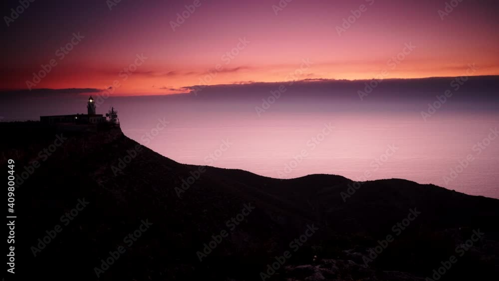Mesa Roldan lighthouse with beacon light, early morning, Cabo de Gata Nijar Natural Park in Almeria province, Andalusia Spain. Tourist attraction, place to visit. Mesa Roldan lighthouse with beacon light, early morning, Cabo de Gata Nijar Natural Park in Almeria province, Andalusia Spain. Tourist attraction, place to visit.