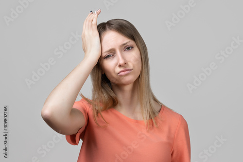 Wallpaper Mural Concerned, frustrated young blond girl feeling fatigue, as suffer pain in head, painful headache or migraine Torontodigital.ca