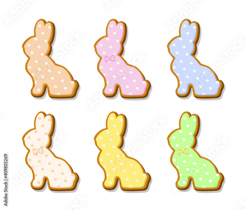 Set of Easter cookies in the form of rabbits. Gingerbread cookies with colored pastel glaze isolated on white background. A holiday of religion. Vector illustration