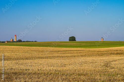 Beautiful view of famous Kap Arkona lighthouse in summer, island of Ruegen, Baltic Sea, Germany photo