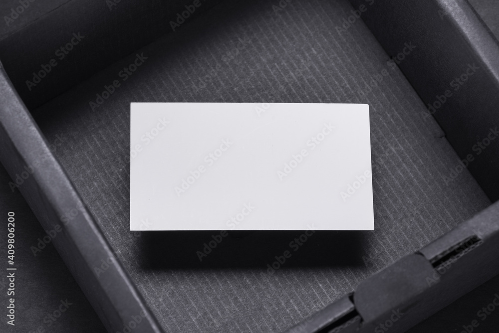 Business card inside of empty black box, mocup Business card inside of empty black box, mocup