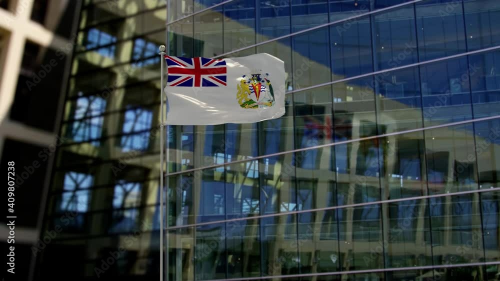 British Antarctic Territory Flag Waving On A Skyscraper Building British Antarctic Territory Flag Waving On A Skyscraper Building