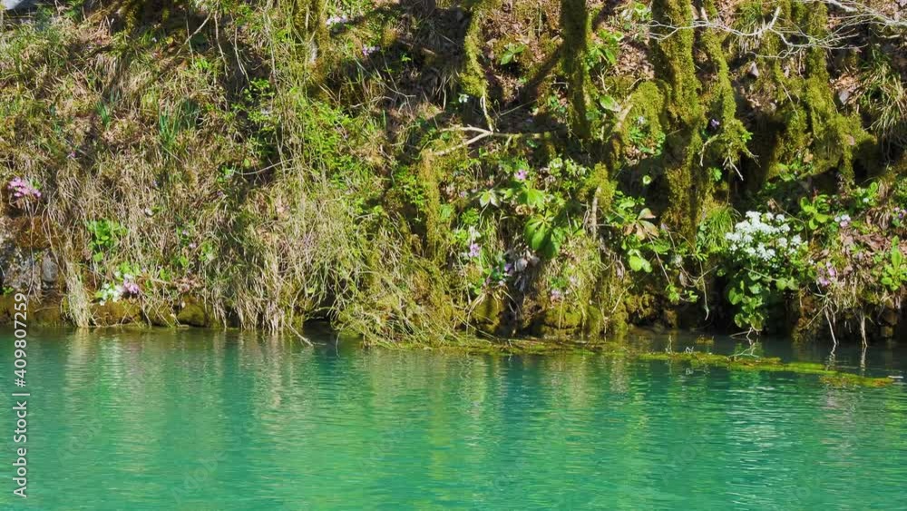 Blue lake of karst origin on right bank of Bzyb River. Landmark in Abkhazia. Blue lake of karst origin on right bank of Bzyb River. Landmark in Abkhazia.