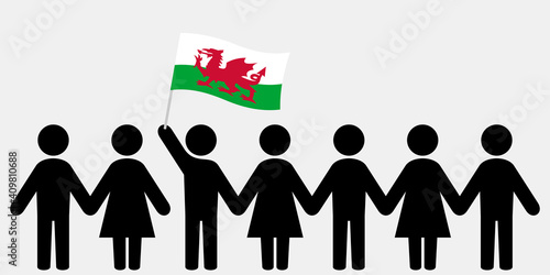 People with welsh flag holding hands