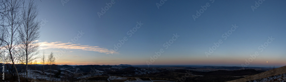 Sunset panorama on a winter evening in the Carpathian region Sunset panorama on a winter evening in the Carpathian region