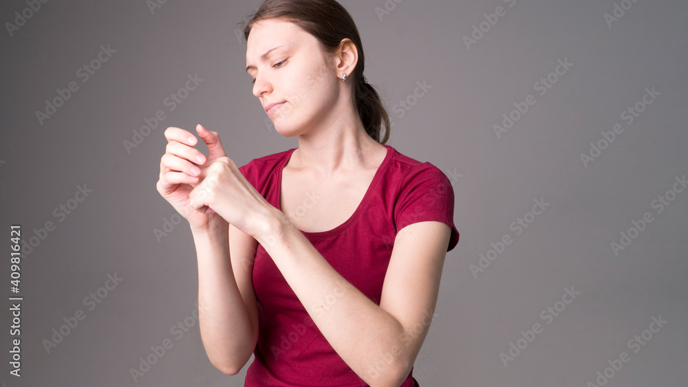 Tired woman feeling pain, massaging tense muscles Tired woman feeling pain, massaging tense muscles