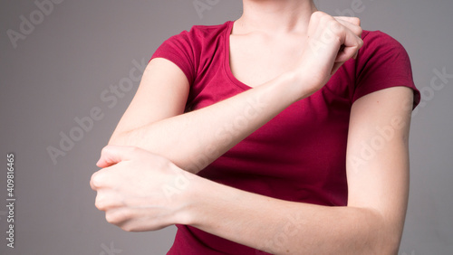 Tired woman feeling pain, massaging tense muscles