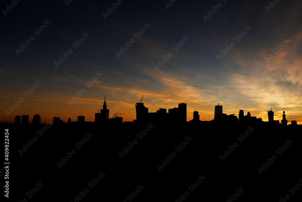 Warsaw Skyline Silhouette At Sunset In Poland