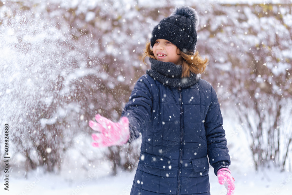 child girl playing with snow in winter outdoor and having fun on snowy winter child girl playing with snow in winter outdoor and having fun on snowy winter