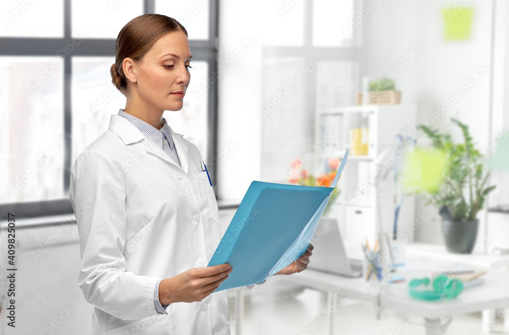 medicine, science and healthcare concept - female doctor in white coat with folder over medical office at hospital on background medicine, science and healthcare concept - female doctor in white coat with folder over medical office at hospital on background