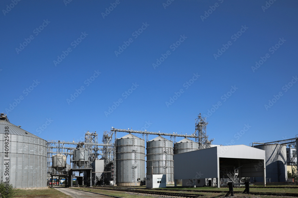 Fototapeta premium View of modern granaries for storing cereal grains outdoors