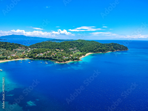 Aerial view over southern skiathos island, Greece with modern hotels and luxurious villas in Sporades, Greece,