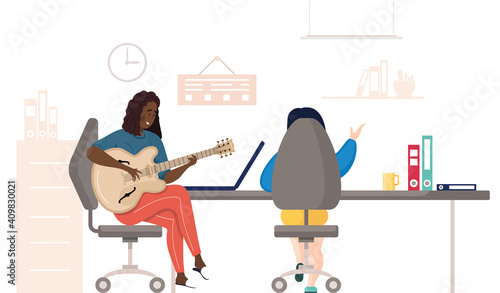 Girl with guitar sitting on chair near table with laptop learns music from lessons remotely. Woman learns to play acoustic guitar stringed musical instrument from video tutorial during break at office
