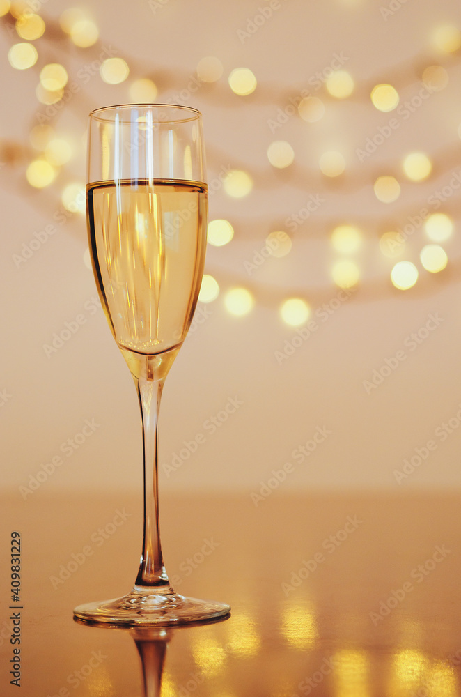 Glass of wine with bokeh background close up. Flat lay. New Year, Christmas mood. Greeting card. Party and holiday celebration concept. Glass of wine with bokeh background close up. Flat lay. New Year, Christmas mood. Greeting card. Party and holiday celebration concept.