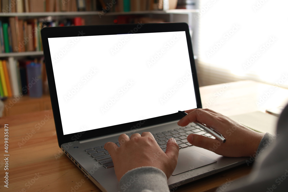 Close up image of laptop mock up, pc computer monitor with white screen template Close up image of laptop mock up, pc computer monitor with white screen template