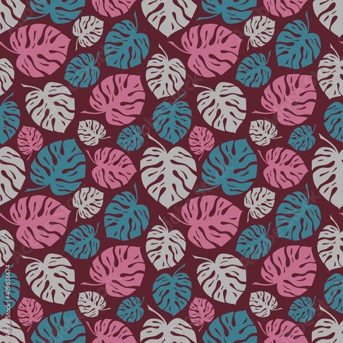 PINK BACKGROUND WITH COLORFUL MONSTERA LEAVES