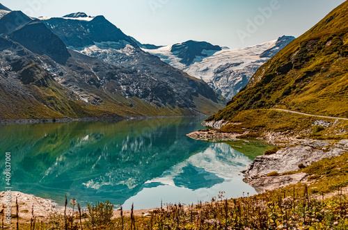 Fototapeta Naklejka Na Ścianę i Meble -  Beautiful alpine summer view with reflections at the famous Kaprun high mountain reservoirs, Salzburg, Austria