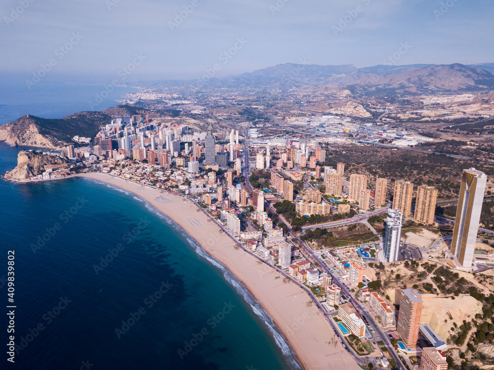 Panoramic view of resort sand coast and buildings of city Benidorm, Spain