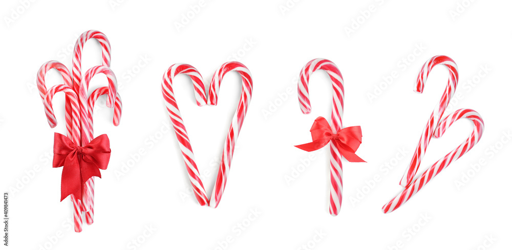 Set of Christmas candy canes on white background, top view. Banner design