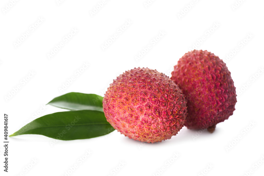 Fresh ripe lychees with green leaves on white background Fresh ripe lychees with green leaves on white background