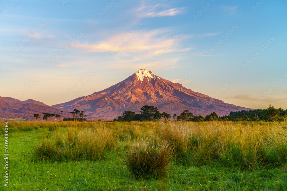 sunset at cone volcano mount taranaki, new zealand sunset at cone volcano mount taranaki, new zealand