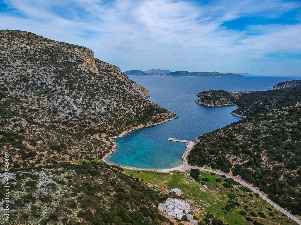 Fototapeta premium Aerial panoramic view of the picturesque old harbor Gerakas in northern Alonnisos, Greece. Beautiful scenery with rocky formation and natural fjord-like bay in Sporades Aegean sea, Greece