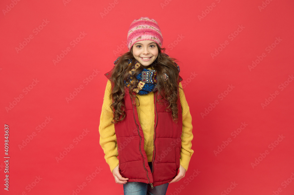 cute beauty keep warm. weather forecast. cheerful girl ready for winter activity. child in puffer waistcoat and knitwear. seasonal kid fashion. christmas holiday and vacation. Cheerful and positive cute beauty keep warm. weather forecast. cheerful girl ready for winter activity. child in puffer waistcoat and knitwear. seasonal kid fashion. christmas holiday and vacation. Cheerful and positive