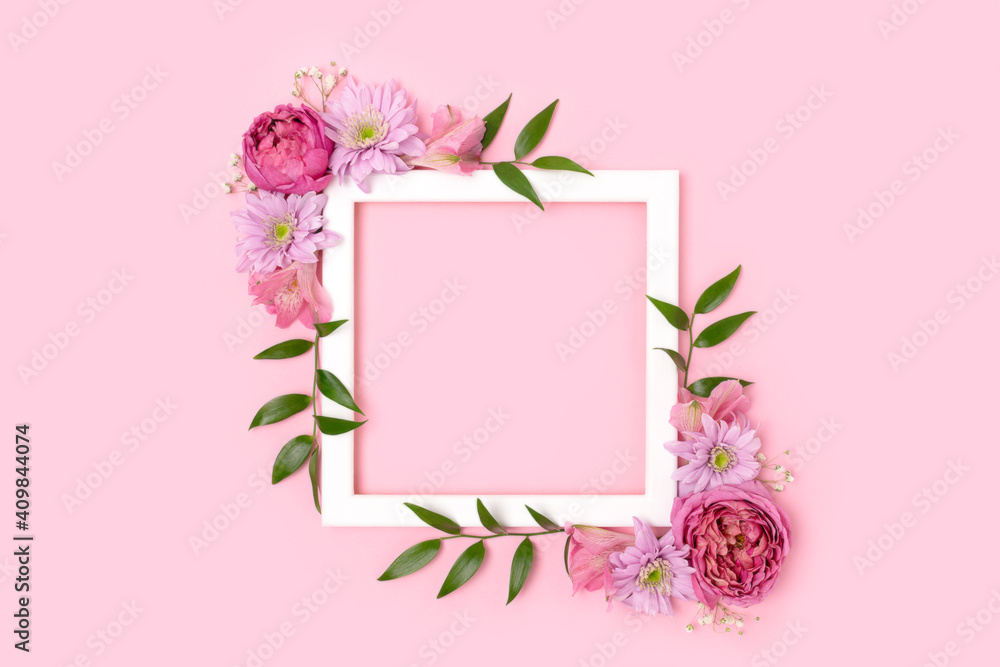 Square flower frame made of rose, aster and alstroemeria on a pink pastel background. Greeting card template with copyspace. Festive concept. Square flower frame made of rose, aster and alstroemeria on a pink pastel background. Greeting card template with copyspace. Festive concept.