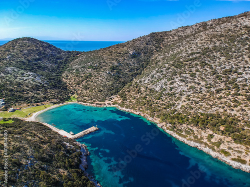 Aerial panoramic view of the picturesque old harbor Gerakas in northern Alonnisos, Greece. Beautiful scenery with rocky formation and natural fjord-like bay in Sporades Aegean sea, Greece