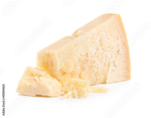 Pieces of delicious parmesan cheese on white background photo