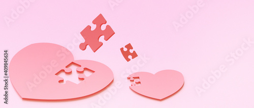 Jigsaw Red Heart Lost and Happy Valentine in Love Concept on Pink Background.digital banner art,Copy Space - 3d rendering