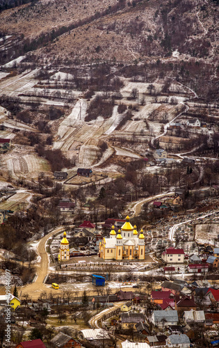Church in winter in a village in the Carpathian mountains