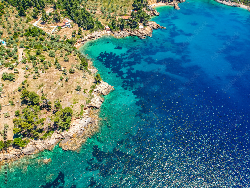 Aerial drone view over Chrisi Milia beach and the rocky surrounded area in Alonnisos island, Sporades, Greece