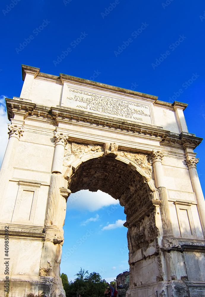 Arch of Titus in Rome, Italy. It was built in 1st Century a.c. and has provided the general model for many triumphal arches built in more recent times, as for example famous Arc de Triomphe in Paris.