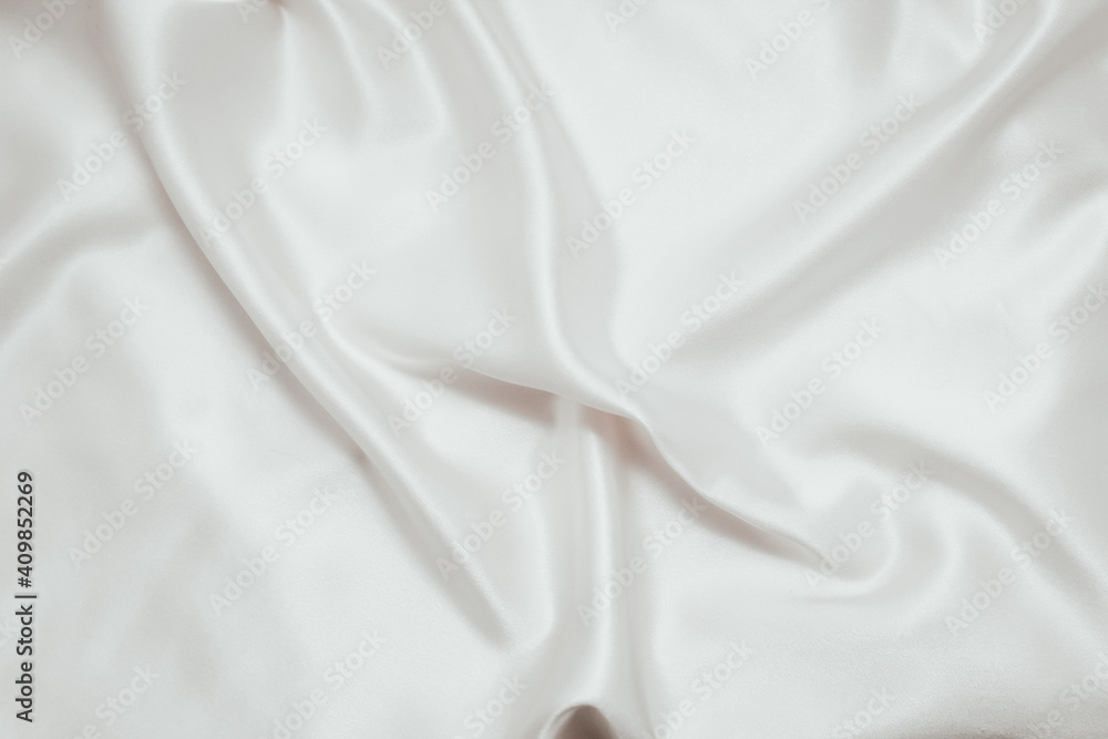White texture of silk, satin. Shiny fabric background.