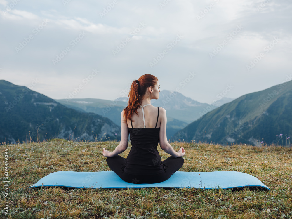 woman yoga asana meditation nature mountains fresh air fitness mat