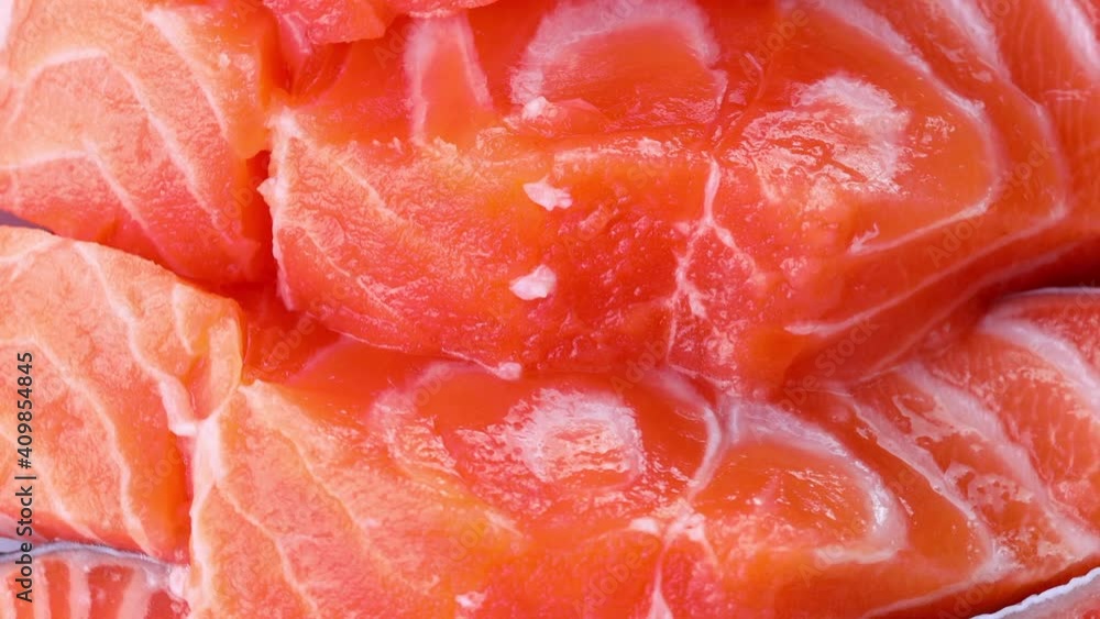 Close-up of slices of fresh raw red salmon Close-up of slices of fresh raw red salmon