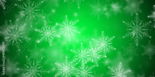 Abstract flashy green background with flying snowflakes