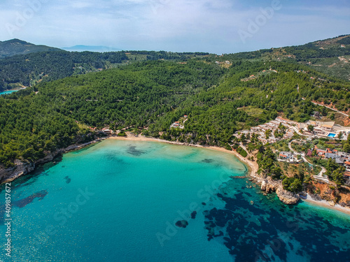 Aerial drone view over Chrisi Milia beach and the rocky surrounded area in Alonnisos island  Sporades  Greece
