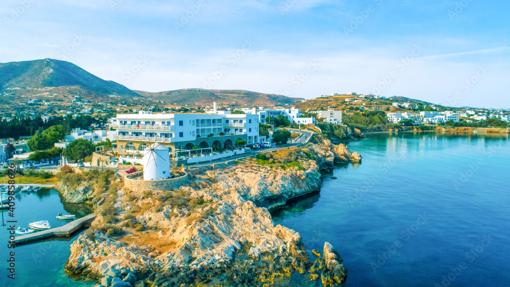 Aerial view of Paros island with windmill on the coast