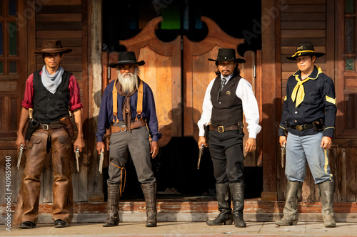 Vintage images of sheriffs and officers, prepared to catch the thieves, rob the bank and carry guns in their hands,