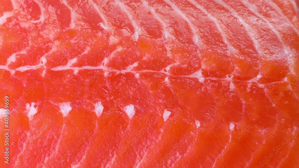 Close-up of slices of fresh raw red salmon Close-up of slices of fresh raw red salmon