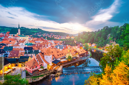 Cityscape of traditional czech small houses surrounded by river